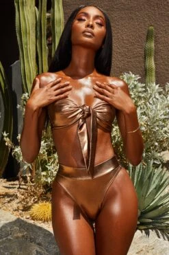 Metallic Tie Front Bandeau Bikini Top In Bronze 16 Metallic Tie Front Bandeau Bikini Top In Bronze -Sway Line Zone 2301 4 gold coast bronze metallic bandeau knot bikini high rise bottoms