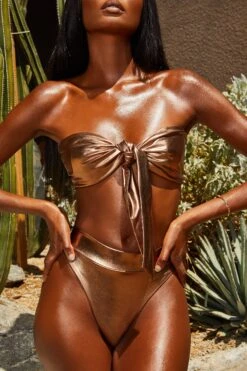 Metallic Tie Front Bandeau Bikini Top In Bronze 21 Metallic Tie Front Bandeau Bikini Top In Bronze -Sway Line Zone 2301 9 gold coast bronze metallic bandeau knot bikini high rise bottoms