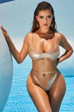 Ribbed Metallic Thong Bikini Bottoms In Rose Gold 23 Ribbed Metallic Thong Bikini Bottoms In Rose Gold -Sway Line Zone 2305 1 cut in line rose gold metallic underboob thong bikini 1