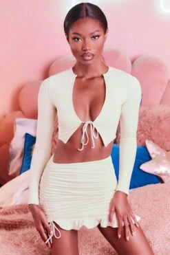 Ruched Bodycon Mini Skirt In Cream 14 Ruched Bodycon Mini Skirt In Cream -Sway Line Zone 3099 tie it up 3409 here for the frill 6 cream front tie bust flattering long sleeve top ruched frill hem mini skirt set 49 1