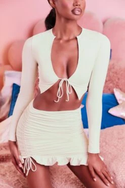 Ruched Bodycon Mini Skirt In Cream 15 Ruched Bodycon Mini Skirt In Cream -Sway Line Zone 3099 tie it up 3409 here for the frill 7 cream front tie bust flattering long sleeve top ruched frill hem mini skirt set 50 1