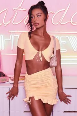 Ruched Bodycon Mini Skirt In Peach -Sway Line Zone 3400 no ties 3409 here for the frill 3 peach front tie plunge crop top capped sleeve high waisted ruched frill skirt 3 2 30a31e5d 917f 4456 b9a8 cf0900655f15