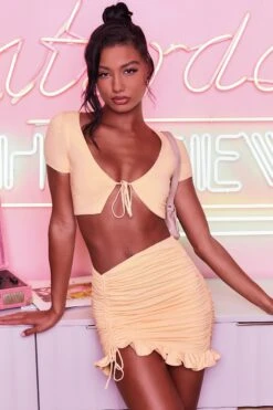 Ruched Bodycon Mini Skirt In Peach -Sway Line Zone 3400 no ties 3409 here for the frill 4 peach front tie plunge crop top capped sleeve high waisted ruched frill skirt 4 2