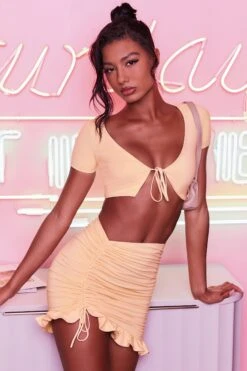 Ruched Bodycon Mini Skirt In Peach -Sway Line Zone 3400 no ties 3409 here for the frill 5 peach front tie plunge crop top capped sleeve high waisted ruched frill skirt 5 2