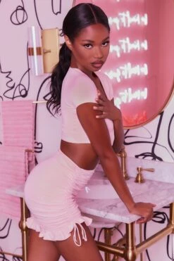 Ruched Bodycon Mini Skirt In Blush 13 Ruched Bodycon Mini Skirt In Blush -Sway Line Zone 3400 no ties 3409 here for the frill 7 blush front tie plunge crop top capped sleeve high waisted ruched frill skirt 3