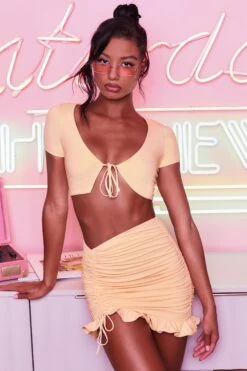 Ruched Bodycon Mini Skirt In Peach -Sway Line Zone 3400 no ties 3409 here for the frill 7 peach front tie plunge crop top capped sleeve high waisted ruched frill skirt 7 2