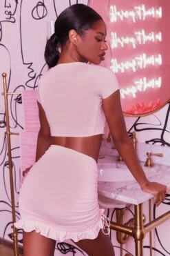 Ruched Bodycon Mini Skirt In Blush 14 Ruched Bodycon Mini Skirt In Blush -Sway Line Zone 3400 no ties 3409 here for the frill 8 blush front tie plunge crop top capped sleeve high waisted ruched frill skirt 3
