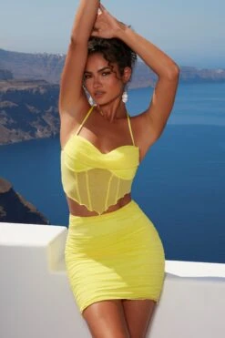 Ruffle Hem Mesh Corset Top In Lime 20 Ruffle Hem Mesh Corset Top In Lime -Sway Line Zone 4360 4 ripple effect lime print coreset top ruched miniskirt 2