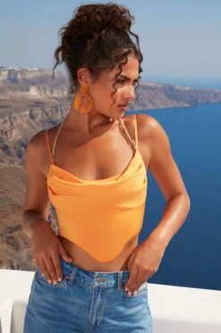 High Tide Halter Chain Crop Top In Orange -Sway Line Zone 4529 6 high tide orange waterfall draped chain detailing satin crop top 1