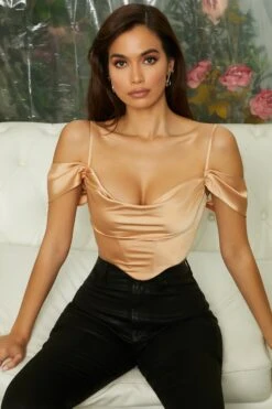 Off The Shoulder Cowl Neck Corset Crop Top In Beige 11 Off The Shoulder Cowl Neck Corset Crop Top In Beige -Sway Line Zone 4785 6 breathless beige satin off shoulder cowl neck corset top 1