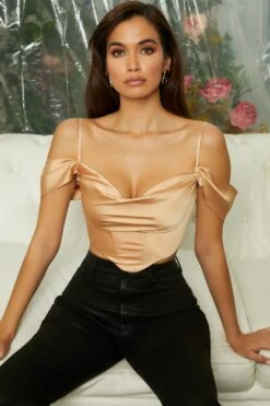 Off The Shoulder Cowl Neck Corset Crop Top In Beige 15 Off The Shoulder Cowl Neck Corset Crop Top In Beige -Sway Line Zone 4785 8 breathless beige satin off shoulder cowl neck corset top 1
