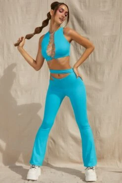 Lace Up Crop Top In Aqua -Sway Line Zone 5125 5132 10 Uptown Valerie Aqua Cut Out Aysmmetic Flares Lace Up Crop Top