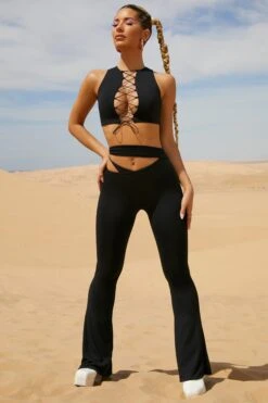 Cut Out Flare Trousers In Black -Sway Line Zone 5125 5132 9 Uptown Valerie Black Cut Out Aysmmetic Flares Lace Up Crop Top