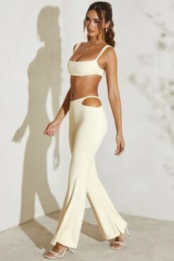 Twist Strap Cut Out Flare Trousers In Ivory -Sway Line Zone 5148 5 Callie Ivory Twost Cut Out Flare Trousers 98b68bdc 295f 4abf 8058 80d806b67e20