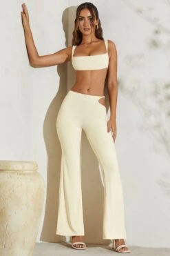 Twist Strap Cut Out Flare Trousers In Ivory -Sway Line Zone 5148 9 Callie Ivory Twost Cut Out Flare Trousers 5b76b41c 97ea 4f83 8d28 08395927e003