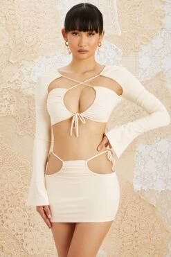 Side Tie Mini Skirt In Ivory -Sway Line Zone 5209 5152 1 Flora Jardin Ivory Drawstring Bust Ruched Crop Top Side Tie Mini Skirt
