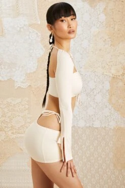 Side Tie Mini Skirt In Ivory -Sway Line Zone 5209 5152 7 Flora Jardin Ivory Drawstring Bust Ruched Crop Top Side Tie Mini Skirt