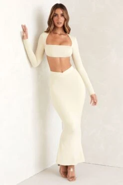 Cut Out Back Long Sleeve Crop Top In Ivory -Sway Line Zone 5418 5434 5 Ivory Long sleeve Caged Back Scoop Front Crop Top V Waist Maxi Skirt With Flared Hemcopy