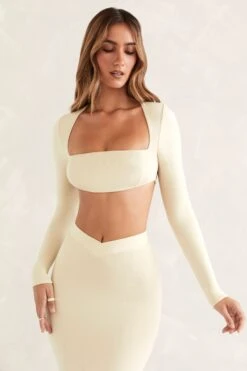 Cut Out Back Long Sleeve Crop Top In Ivory -Sway Line Zone 5418 5434 7 Ivory Long sleeve Caged Back Scoop Front Crop Top V Waist Maxi Skirt With Flared Hemcopy
