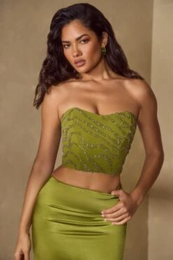 Embellished Bandeau Corset Top In Olive 20 Embellished Bandeau Corset Top In Olive -Sway Line Zone 5929 6745 4 Mina Olive Vorset Top Thigh Split Skirt