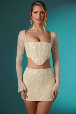 Long Sleeve Embellished Lace Corset Crop Top In Ivory