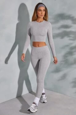 Round Neck Long Sleeve Top In Marled Grey 27 Round Neck Long Sleeve Top In Marled Grey -Sway Line Zone 6055 6064 14 Camden Lori Marled Grey Seamless Crop Top Leggings
