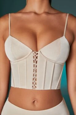Lace Up Front Corset Crop Top In Ivory -Sway Line Zone 6556 10 6557 Ivory Satin Corset Top Bias Cut Low Rise Mini Skirt