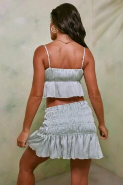 Shirred Tie Up Front Crop Top In Pastel Green 22 Shirred Tie Up Front Crop Top In Pastel Green -Sway Line Zone 7195 7206 10 Pastel Green Tie Up Front Crop Top Crinkle Tie Up Asymmetrical Shirring Mini Skirt