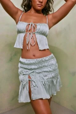 Shirred Tie Up Front Crop Top In Pastel Green 16 Shirred Tie Up Front Crop Top In Pastel Green -Sway Line Zone 7195 7206 8 Pastel Green Tie Up Front Crop Top Crinkle Tie Up Asymmetrical Shirring Mini Skirt